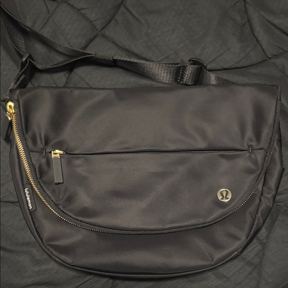 lululemon athletica Black Messenger Bag with Gold Accents